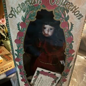 Porcelain Doll in Red Dress